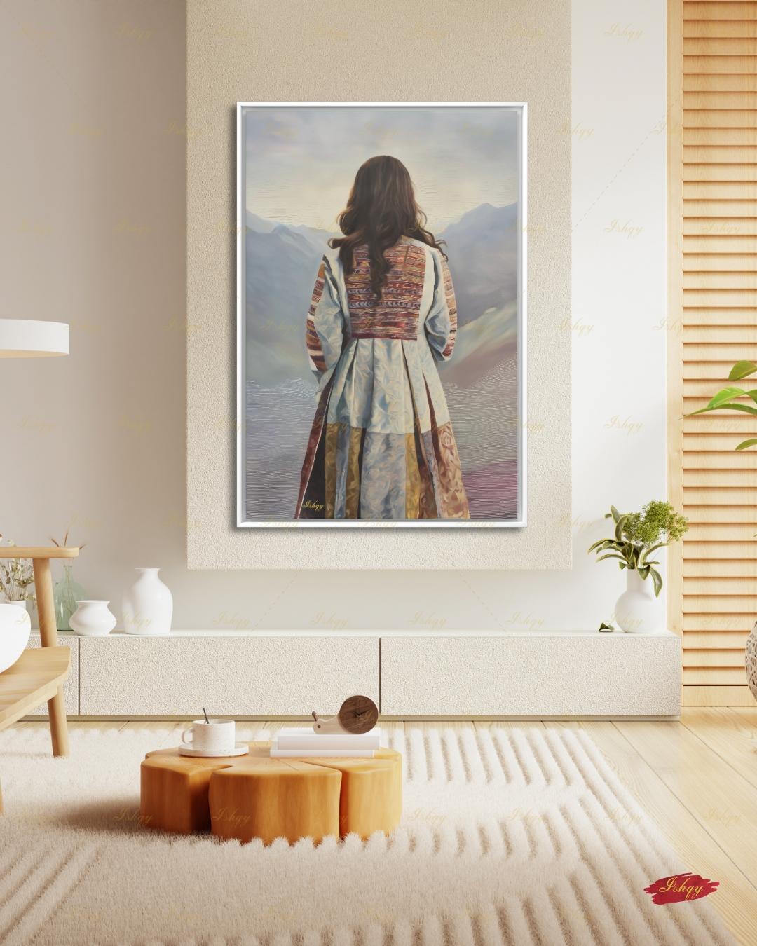 Back-view portrait of a woman with long dark wavy hair wearing a traditional Afghan embroidered dress with intricately paneled fabric in blue, rust, and earth tones, against a misty layered mountain landscape.