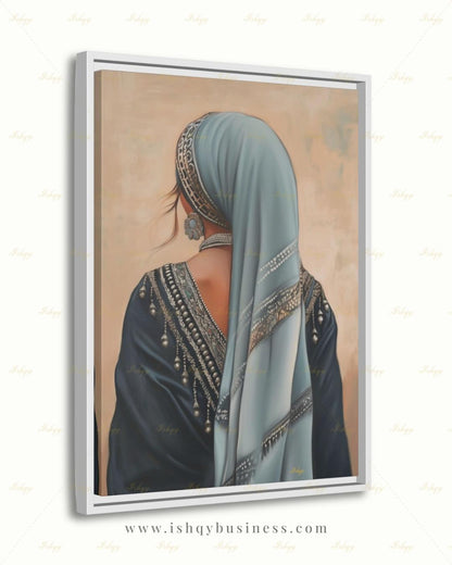Berber Woman Wall Art, North African Portrait Print, Moroccan Tribal Canvas, Amazigh Culture Decor, Elegant Framed Canvas, Morocco Art Gift. Back-view portrait of a woman in a pale blue veil with an ornate silver headband, wearing a navy embroidered garment with silver beading and dangling ornaments, a floral silver earring, and a pearl necklace, against a warm beige textured background.
