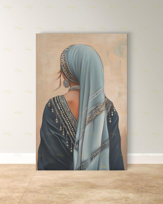 Berber Woman Wall Art, North African Portrait Print, Moroccan Tribal Canvas, Amazigh Culture Decor, Elegant Framed Canvas, Morocco Art Gift. Back-view portrait of a woman in a pale blue veil with an ornate silver headband, wearing a navy embroidered garment with silver beading and dangling ornaments, a floral silver earring, and a pearl necklace, against a warm beige textured background.