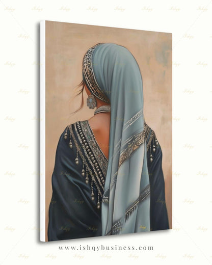 Berber Woman Wall Art, North African Portrait Print, Moroccan Tribal Canvas, Amazigh Culture Decor, Elegant Framed Canvas, Morocco Art Gift. Back-view portrait of a woman in a pale blue veil with an ornate silver headband, wearing a navy embroidered garment with silver beading and dangling ornaments, a floral silver earring, and a pearl necklace, against a warm beige textured background.