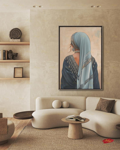 Berber Woman Wall Art, North African Portrait Print, Moroccan Tribal Canvas, Amazigh Culture Decor, Elegant Framed Canvas, Morocco Art Gift. Back-view portrait of a woman in a pale blue veil with an ornate silver headband, wearing a navy embroidered garment with silver beading and dangling ornaments, a floral silver earring, and a pearl necklace, against a warm beige textured background.