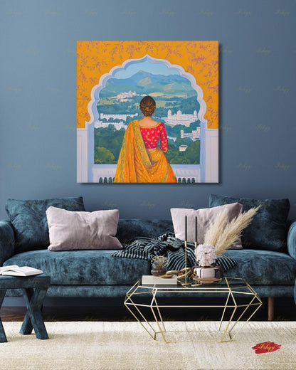 Back-view artwork of a woman in a marigold and red embroidered saree with an updo, looking through a scalloped Mughal archway at a landscape of white hilltop palaces, green hills, and blue mountains, with floral motifs on an orange border.