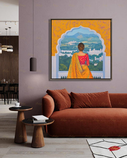 Back-view artwork of a woman in a marigold and red embroidered saree with an updo, looking through a scalloped Mughal archway at a landscape of white hilltop palaces, green hills, and blue mountains, with floral motifs on an orange border.