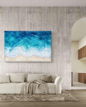 Beach shore wall art featuring a tranquil ocean shoreline and blue waves. Ideal for coastal decor, this serene canvas brings the calming beauty of the beach into any space. ​​