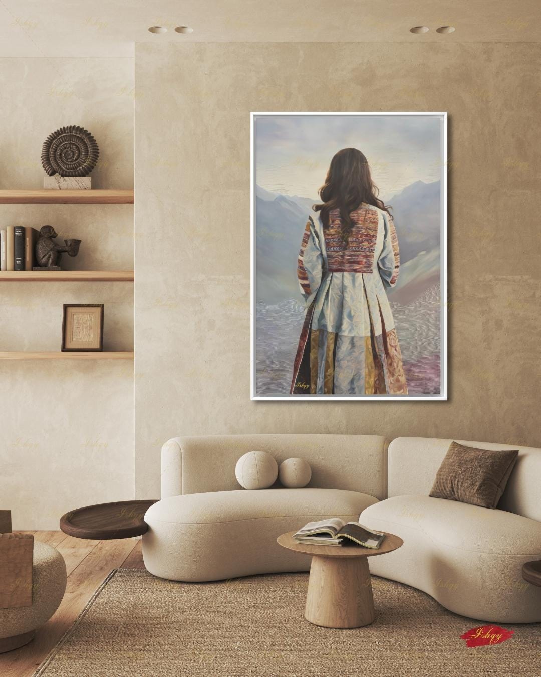 Back-view portrait of a woman with long dark wavy hair wearing a traditional Afghan embroidered dress with intricately paneled fabric in blue, rust, and earth tones, against a misty layered mountain landscape.